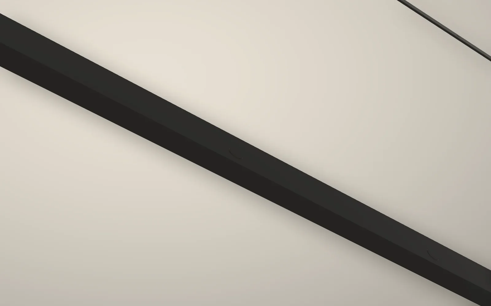 A capped screw on the bottom rail